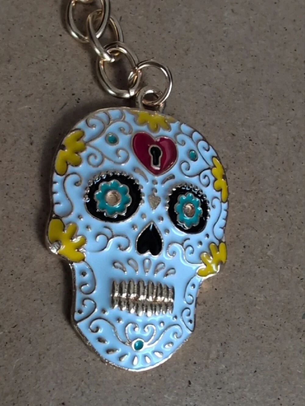 Gold-Tone White Sugar Skull Keychain by